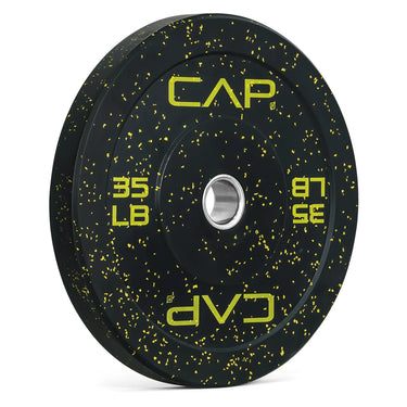 Black CAP bowling ball with neon yellow splatter graphic, urethane/polyurethane finish